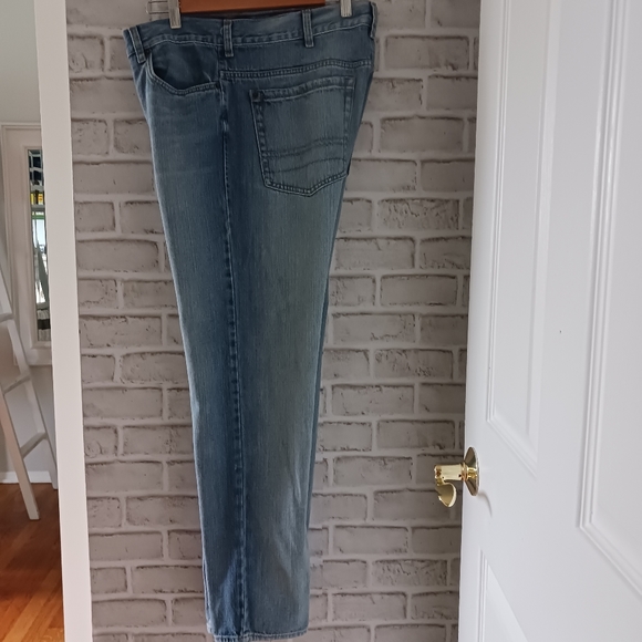 Calvin Klein • Men's Light/Medium Wash Distressed Bootcut Denim Jeans - Picture 7 of 15